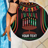 Round black Kwanzaa beach blanket with kinara candle scene and 'YOUR TEXT' band