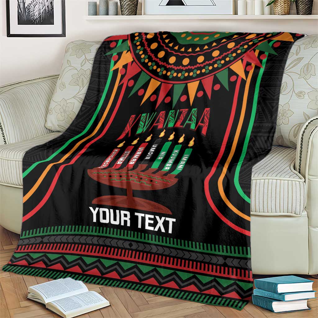 Black Kwanzaa kinara candle personalized blanket on couch with colorful concentric wave trim