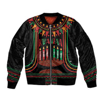 Black bomber jacket with kinara candles graphic, zip front, green-red striped trim