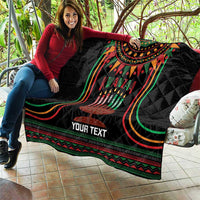 Black personalized Kwanzaa quilt blanket held up with candleholder design and “YOUR TEXT”