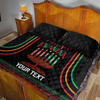 Black Kwanzaa quilt bed set with Kinara candle graphic and “YOUR TEXT” across quilt