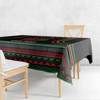 Black Kwanzaa tablecloth with geometric pattern border and hanging corner