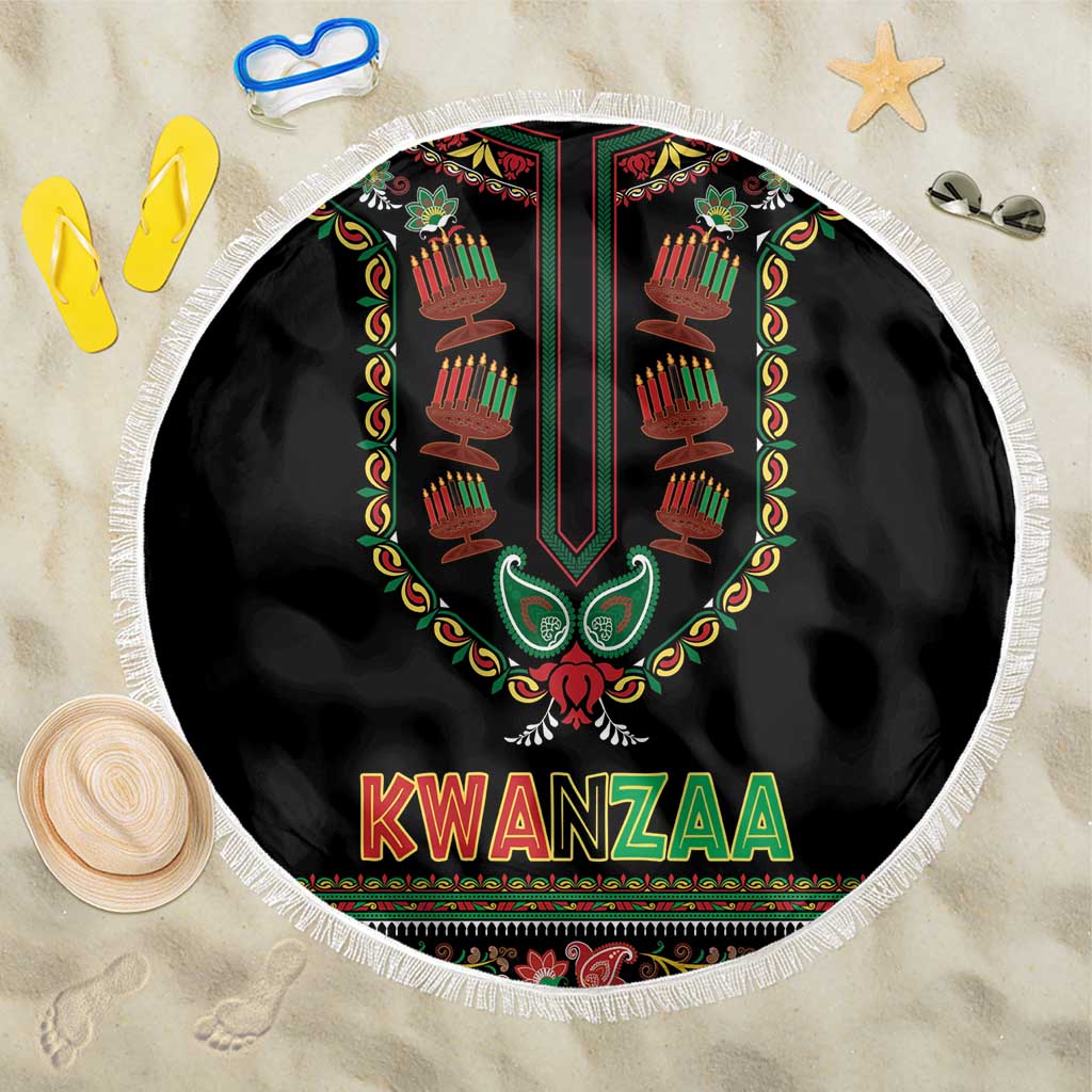 Round black Kwanzaa beach blanket with fringed edge, candle graphic, and “KWANZAA” text