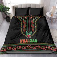 Black Kwanzaa duvet set with two matching pillows, bold colorful dashiki motif and trim border
