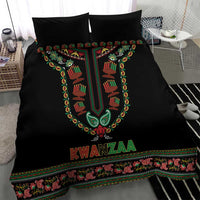 Black Kwanzaa bedding set with two pillows, central dashiki-style hands symbol and “KWANZAA” text