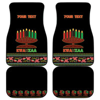 Set of four black Kwanzaa car floor mats with candles, “KWANZAA,” and ornate trim