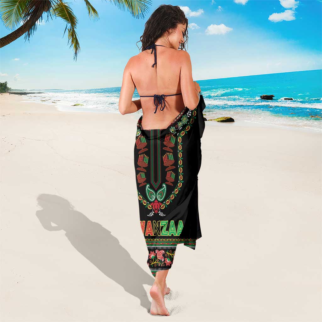 Black Kwanzaa dashiki-style sarong with central “KWANZAA” print and patterned hem