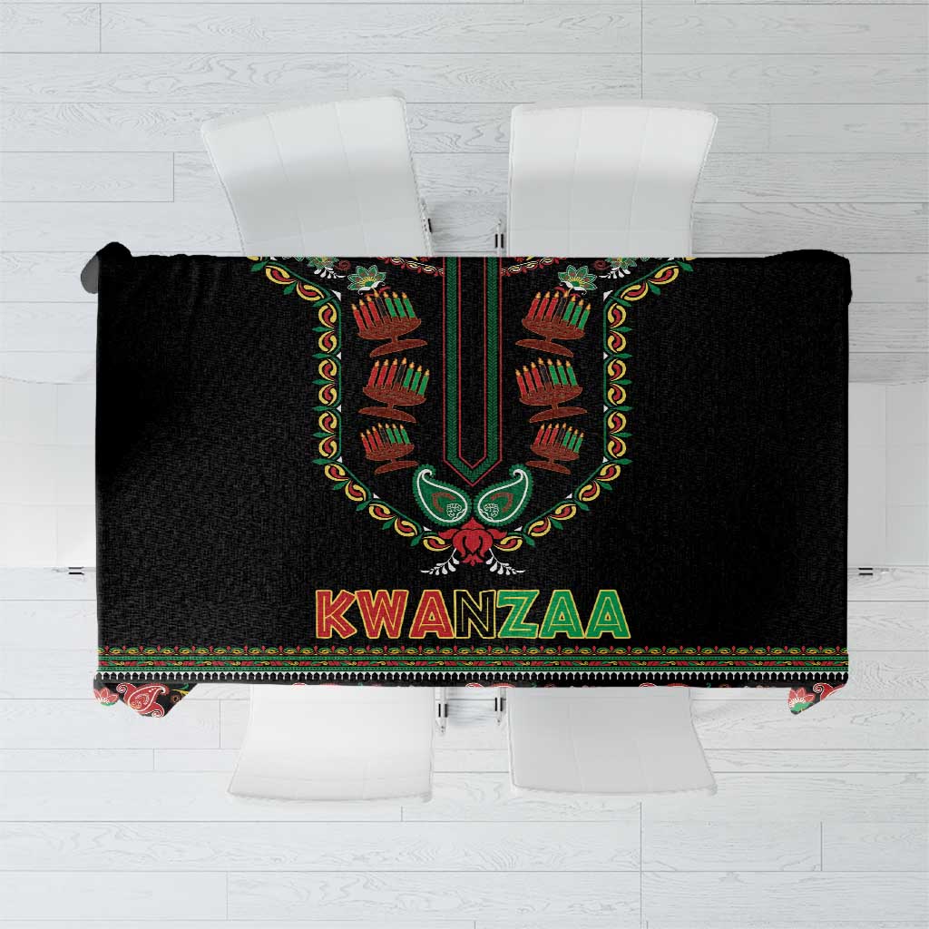 Black tablecloth with colorful Kwanzaa emblem and paisley-style border