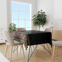 Black tablecloth with multicolor paisley border and vertical dashiki-style band