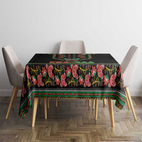 Black square tablecloth with multicolor paisley border and central vertical panel