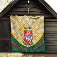 Lithuania quilt blanket hanging in doorway, yellow top, green bottom, red curve, crest emblem