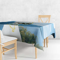 Blue tablecloth with Saint Lucia island map outline and mountain photo-style print on table