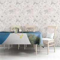 Blue tablecloth with Saint Lucia island map outline and mountain scenic print on dining table