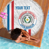 Paraguay football beach blanket, white round fringe with crest and tricolor stripes, top view.
