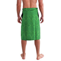 Green lavalava wrap skirt with geometric pattern and black side stripe