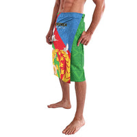 Lavalava wrap skirt with blue, green, and red flag print on one side