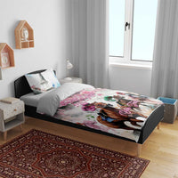 Pink horse racing duvet cover set on bed with matching pillows and jockeys print