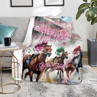 Pink horse racing blanket draped on sofa with jockey horses, rose graphics, and 'Your Text' design