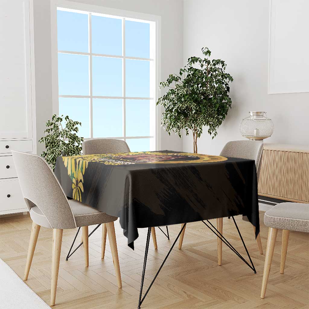 Black tablecloth with yellow horse and flower design on dining table
