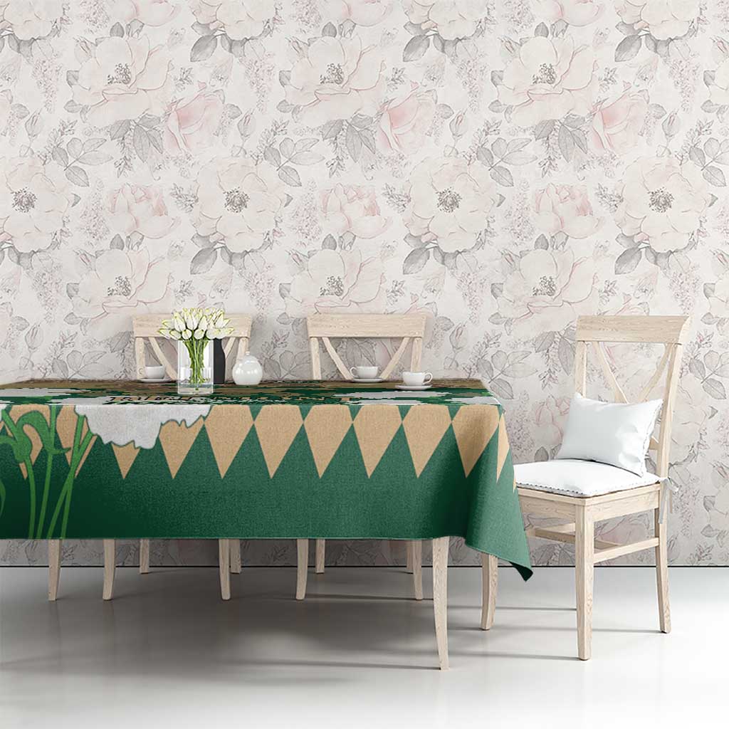 Green horse racing tablecloth with Belmont Stakes print and white geometric accents on table