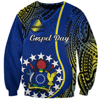 Blue sweatshirt with circular Gospel Day graphic, stars, bird, fish, and Cook Islands text