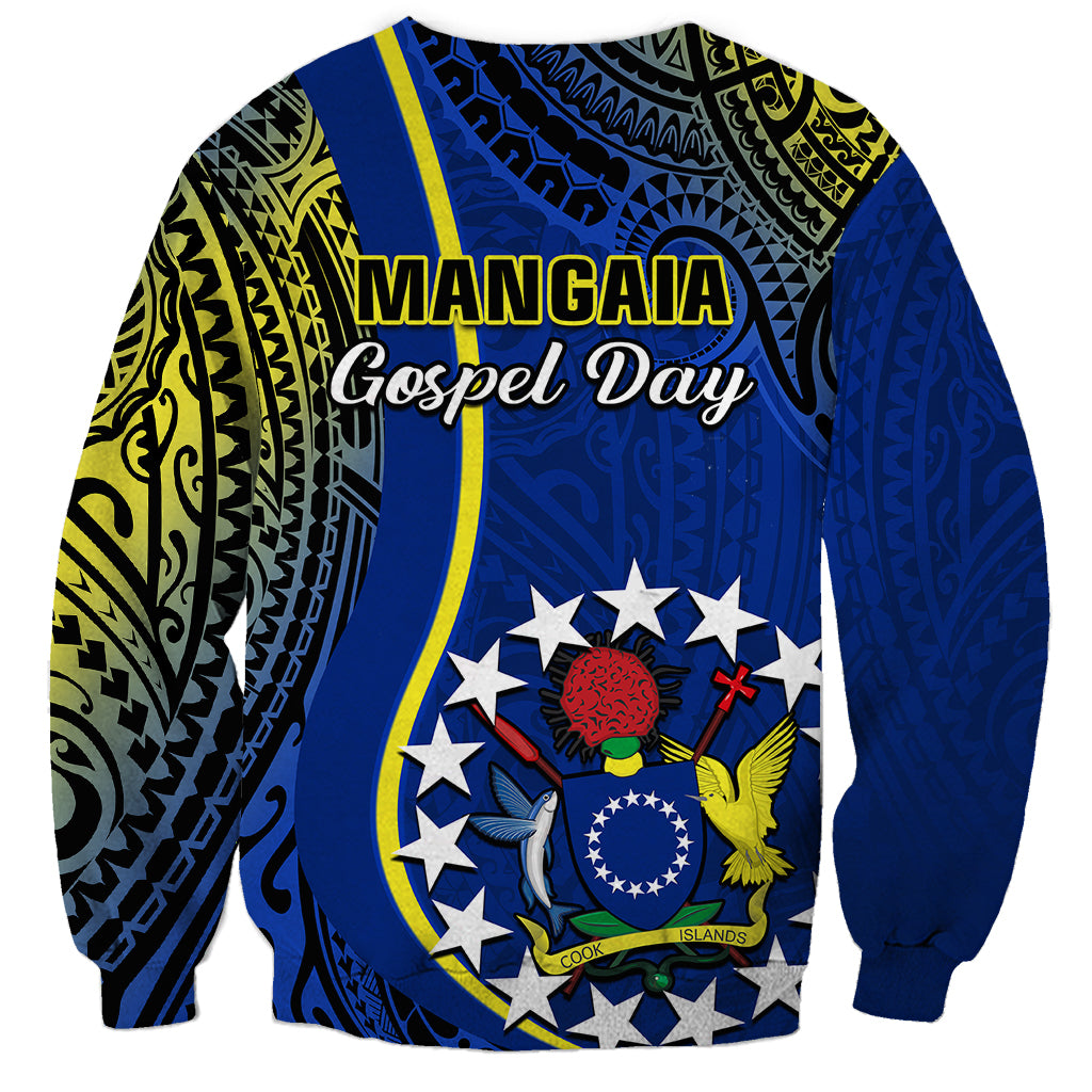 Blue sweatshirt with Mangaia Gospel Day text across back and circular crest graphic with stars