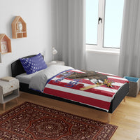 USA bedding set on bed with eagle artwork, red white blue stripes, and star pillowcases