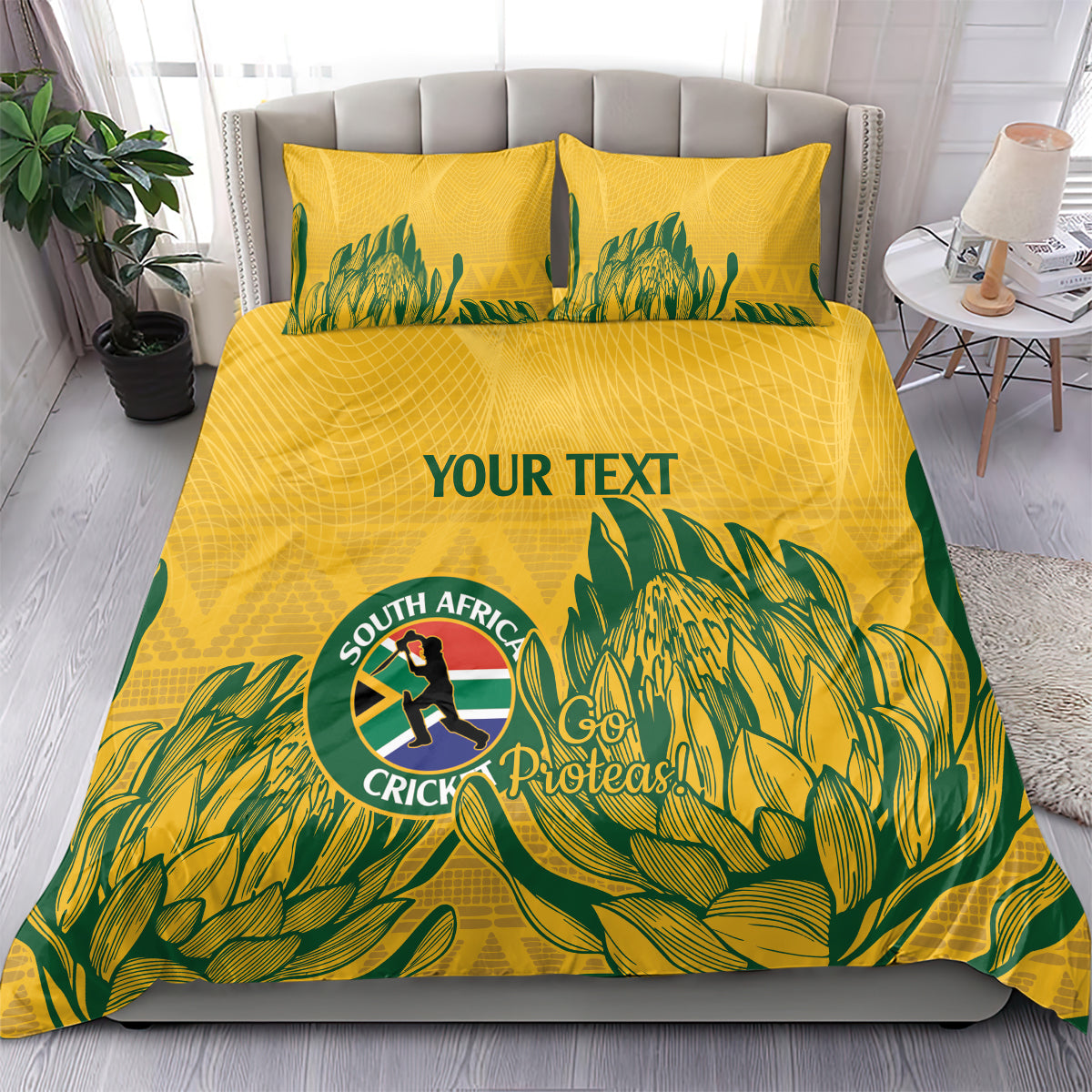 Yellow duvet and matching pillows with green tropical print, Proteas crest, and “YOUR TEXT”