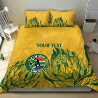 Yellow bedding set featuring green leaf pattern, South Africa Cricket Proteas logo, “YOUR TEXT”
