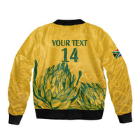 Yellow bomber jacket with YOUR TEXT 14 on back, green botanical print, ribbed hem