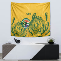 Yellow decorative cricket tapestry with green leaves, South Africa Proteas crest and 'YOUR TEXT'.