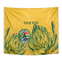 Yellow wall tapestry with green foliage pattern, South Africa cricket crest, 'YOUR TEXT'.