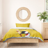 Yellow bedding set with crowned crane scene, sunburst rays, and two pillowcases