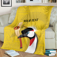Yellow cricket blanket close-up showing crowned crane artwork and 'YOUR TEXT'