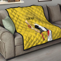 Yellow quilted blanket with black border, crowned crane graphic, custom text, sunburst rays