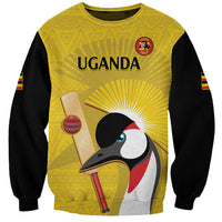 Unisex yellow cricket sweatshirt with black sleeves and Uganda crane team graphic