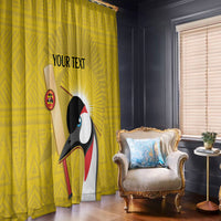 Yellow floor-length window curtains with crowned crane graphic and text placement.