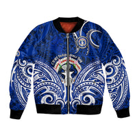 Blue bomber jacket with tribal wave pattern, front zipper and ribbed cuffs