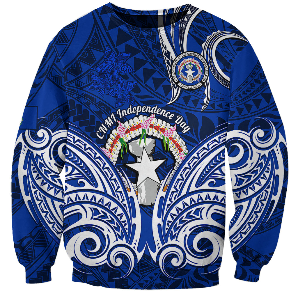 Blue crewneck sweatshirt with tribal pattern and circular Independence Day emblem