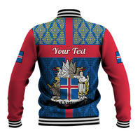 Blue and red baseball jacket back with Your Text and Iceland crest; ribbed striped hem