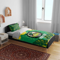 Green and yellow Jamaica Tallawahs bedding set on bed with duvet and accent pillow.