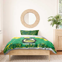 Green and yellow Jamaica Tallawahs duvet with “YOUR TEXT” and two coordinating pillowcases.