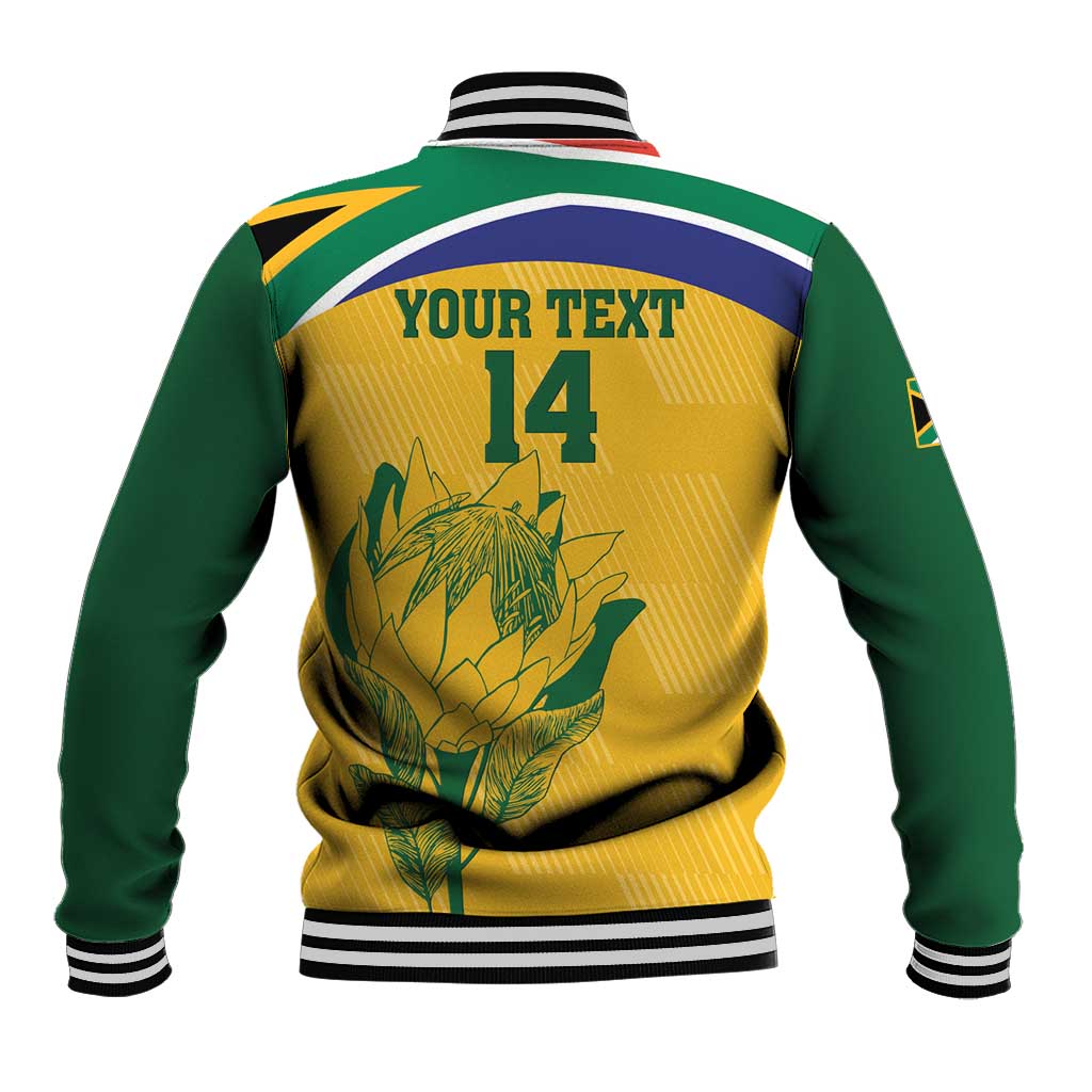 Back view of yellow and green varsity jacket with striped ribbed collar, protea and 14