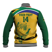 Back view of yellow and green varsity jacket with striped ribbed collar, protea and 14