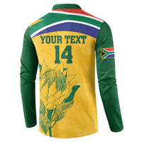 Back of long-sleeve cricket jersey, yellow panel with YOUR TEXT 14 and protea graphic