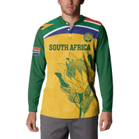 Long-sleeve South Africa cricket jersey, green collar, yellow front with protea graphic