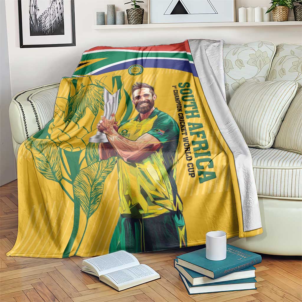 South Africa cricket blanket on bed, yellow flag artwork with 'SOUTH AFRICA' lettering and player