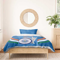 Blue duvet and pillow set with cricket emblem, trophy art, and orange, green, white stripe accents