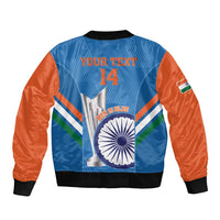 Blue bomber jacket with orange sleeves, ribbed collar and cuffs, front zipper graphic patch