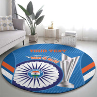 Blue circular cricket carpet rug with India emblem and silver fan rays across center